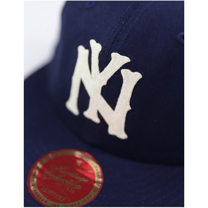 Brooklyn Eagles Heritage Snapback Baseball Cap (Front Detail) - Navy blue cap with white logo and red label on a white background