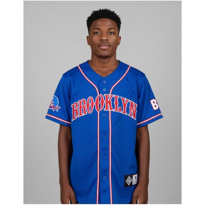 Brooklyn Royal Giants Negro League Baseball Jersey (Lifestyle) - Person wearing a blue 'Brooklyn' baseball jersey on a gray background
