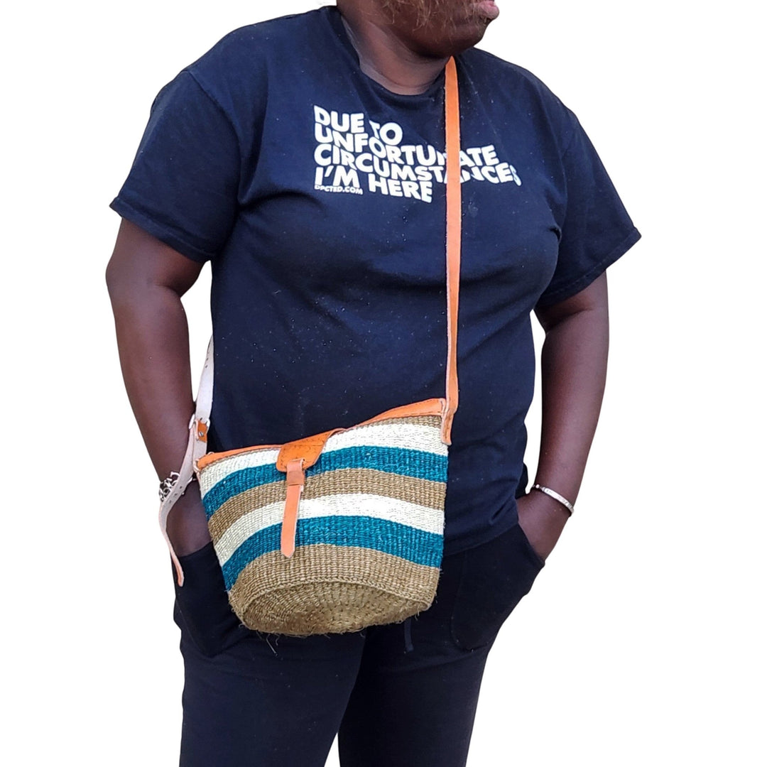 Nanyori: Authentic Hand Woven Sisal and Leather Kenyan Kiondo (Lifestyle View - Brown, Teal and Natural Colors)