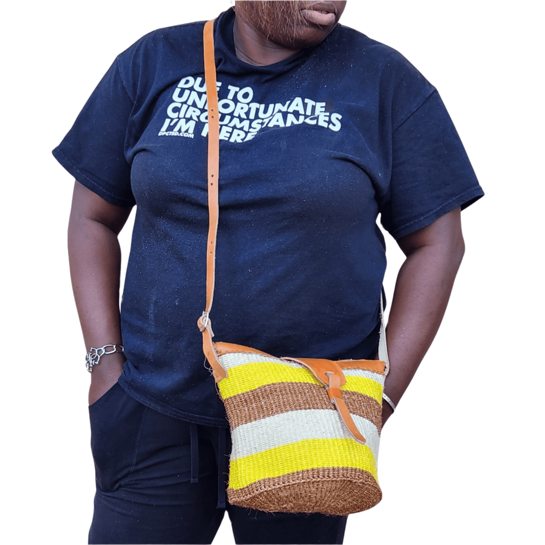 5 of 12: Nanyori: Authentic Hand Woven Sisal and Leather Kenyan Kiondo (Lifestyle View - Brown, Yellow and Natural Colors)