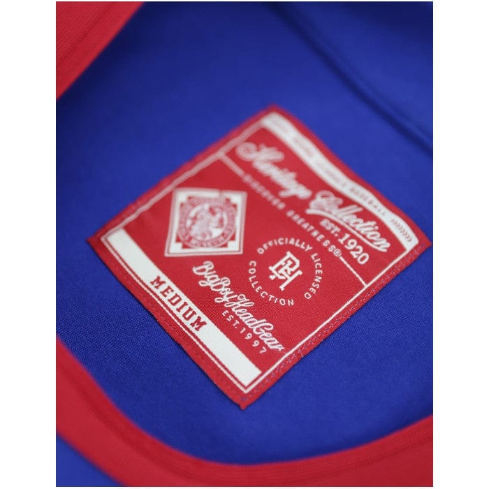 6 of 8: Hank Aaron: Indianapolis Clowns Heritage Baeball Jersey - Blue baseball jersey with red accents and 'Clowns' text on a white background (Inside Detail)
