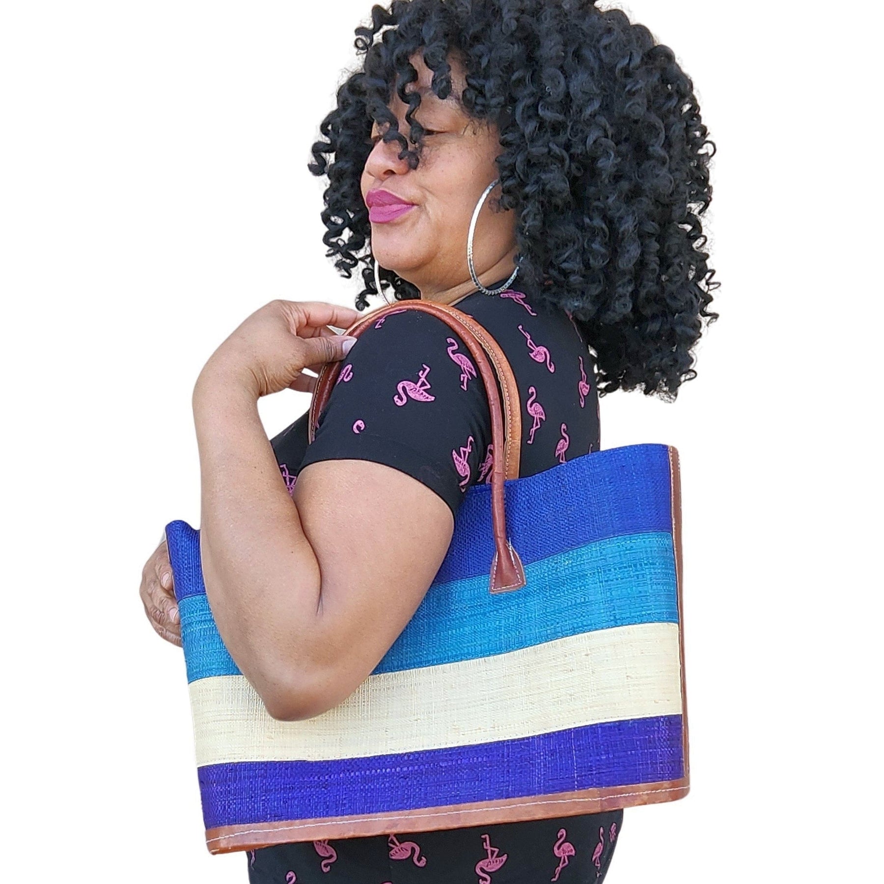 6 of 18: Titi: Hand Woven Madagascar Raffia and Leather Hand Bag Set (Lifestyle 1)