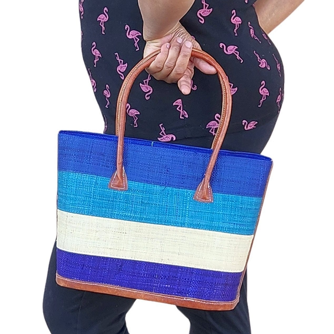 10 of 18: Titi: Hand Woven Madagascar Raffia and Leather Hand Bag Set (Lifestyle 5)