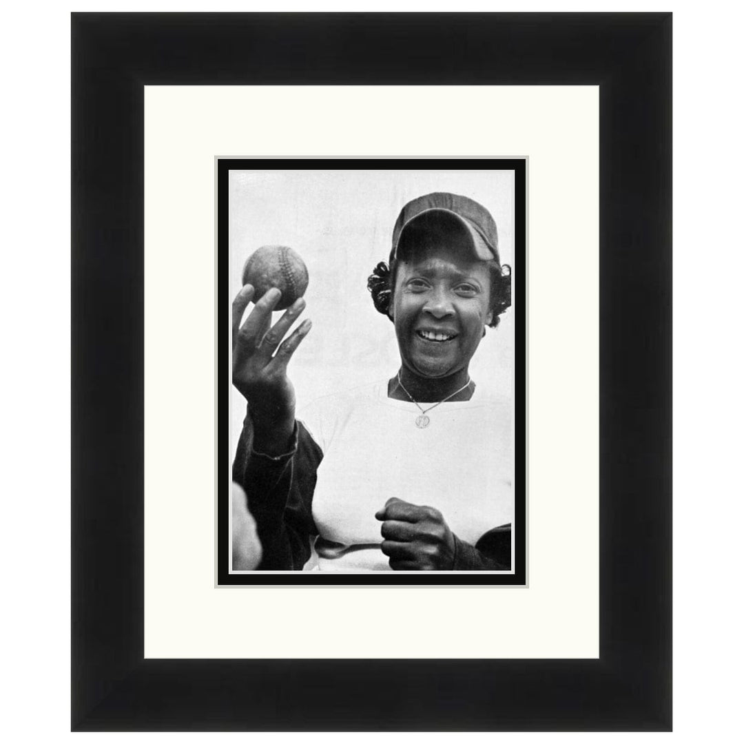 Toni Stone: Female Baseball Pioneer - Framed black and white photo of a person holding a baseball and ball glove. (Black Frame)