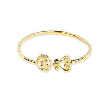 Gold ring with ‘LOVE’ in cursive and embedded gems on an intricate band.