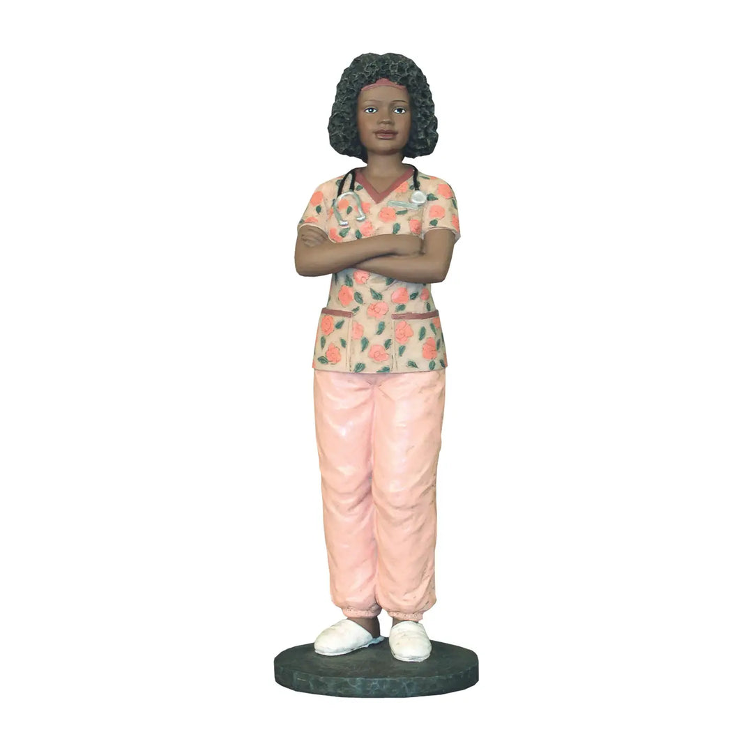 African American Female Professional Nurse Figurine (Main) - Statue of a person wearing a patterned shirt and pink pants on a white background