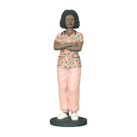 African American Female Professional Nurse Figurine (Main) - Statue of a person wearing a patterned shirt and pink pants on a white background