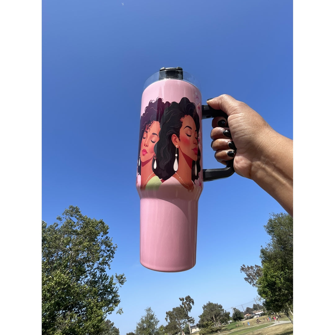 Alpha Kappa Alpha Ivy Love Sisterhood Tumbler with Handle (Lifestyle) - Tumbler held up against the sky