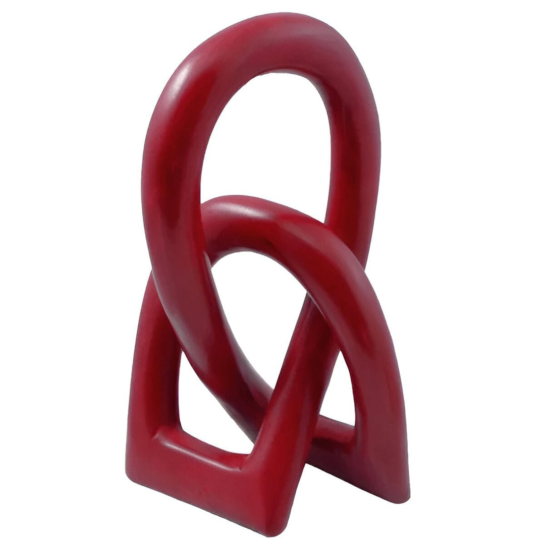 Authentic African Handmade Soapstone Eternity Knot/Love Knot (Red) -Red abstract sculpture on a white background