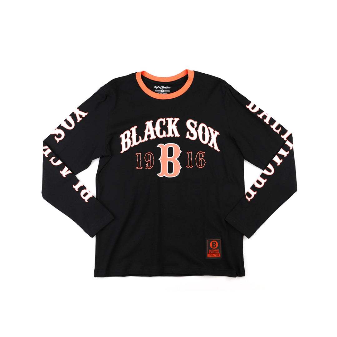 Baltimore Black Sox Long Sleeve T-Shirt (Main) - A black long-sleeve t-shirt with 'BLACK SOX 1916' printed in white and orange on the front, featuring 'DUALITY' printed down both sleeves and a small orange logo patch near the bottom hem.