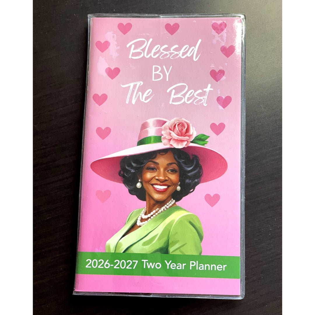 Blessed by the Best (Ivy Edition): 2026-2027 Two Year Planner (Lifestyle Photo 2) - Planner with a woman's portrait and 'Blessed by the Best' text on a pink background