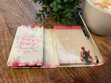 Blessings Upon Blessings (Ivy) Stylus Purse Pal by Kiwi McDowell (Interior) - Open notebook with floral design on a wooden surface with a plant and cup in the background