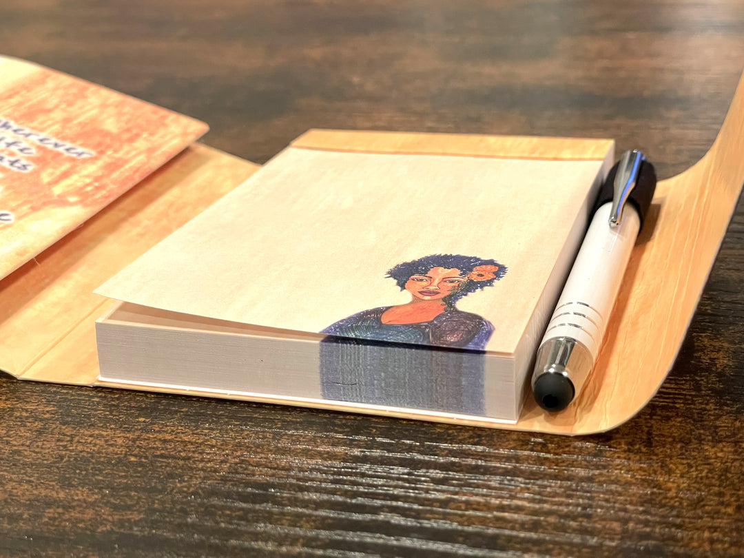 Bloom With Grace: African American Stylus Purse Pal by Sylvia "Gbaby" Cohen (Interior) - Notebook with a pen on a wooden surface