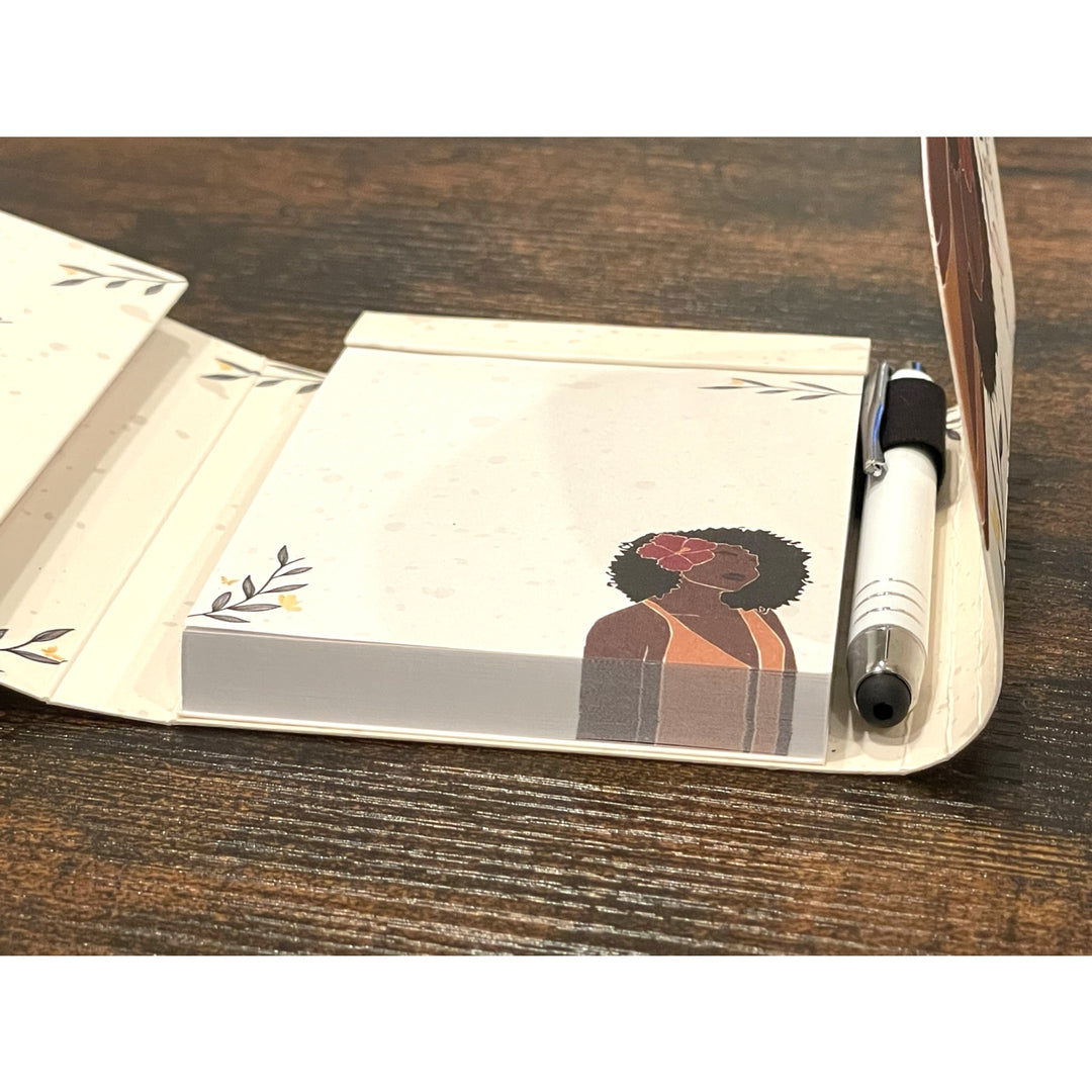 Blossom and Grow: African American Stylus Purse Pal by Janine Robinson (Interior Detail) - Notebook with a drawing of a woman on a wooden surface