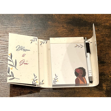 Blossom and Grow: African American Stylus Purse Pal by Janine Robinson (Interior) - Open notebook with floral design on a wooden surface