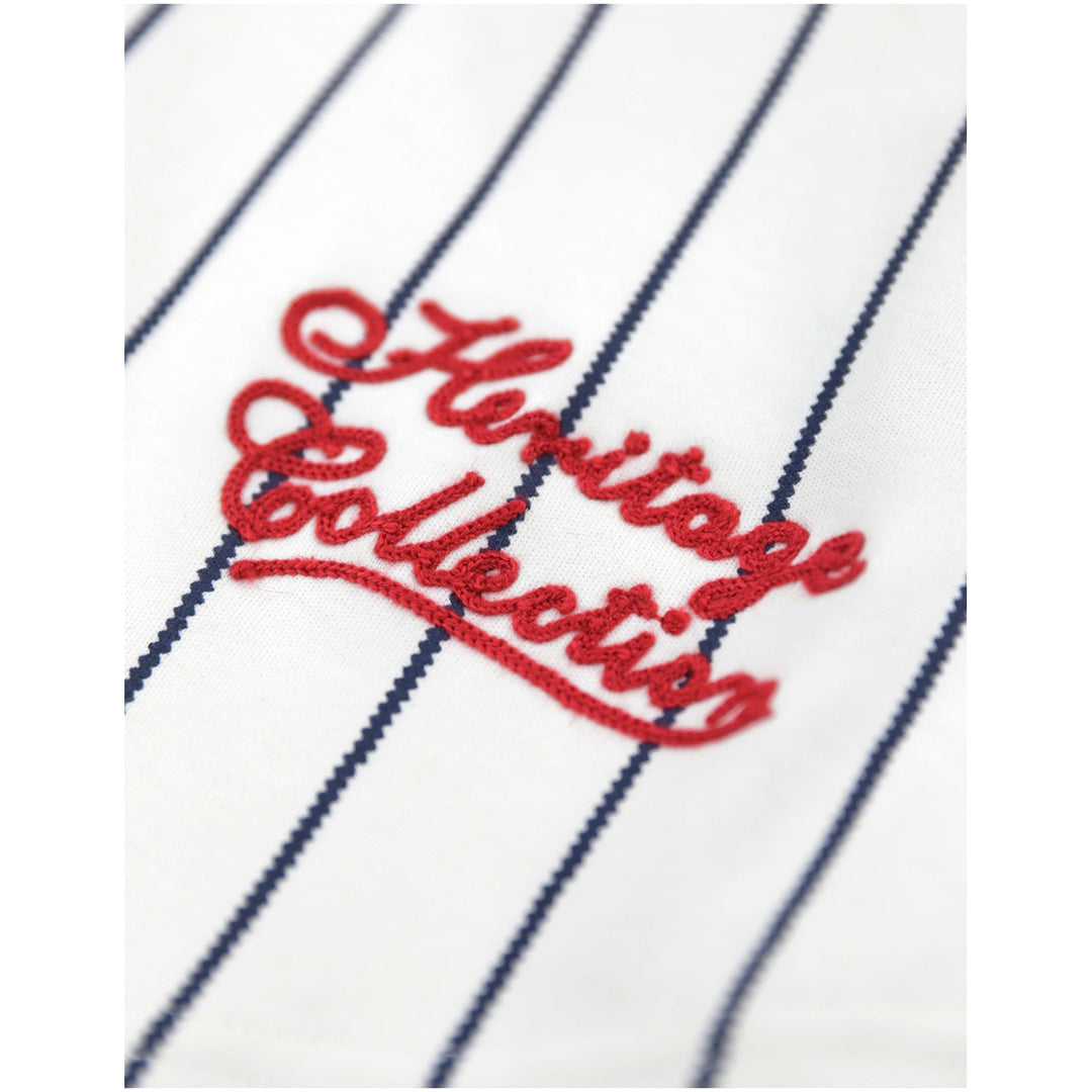 Chicago American Giants Heritage Negro Leagues Baseball Jersey (Front Detail 2) - Close-up of a white pinstriped fabric with navy vertical stripes and red embroidered script reading 'Heritage Collection'.