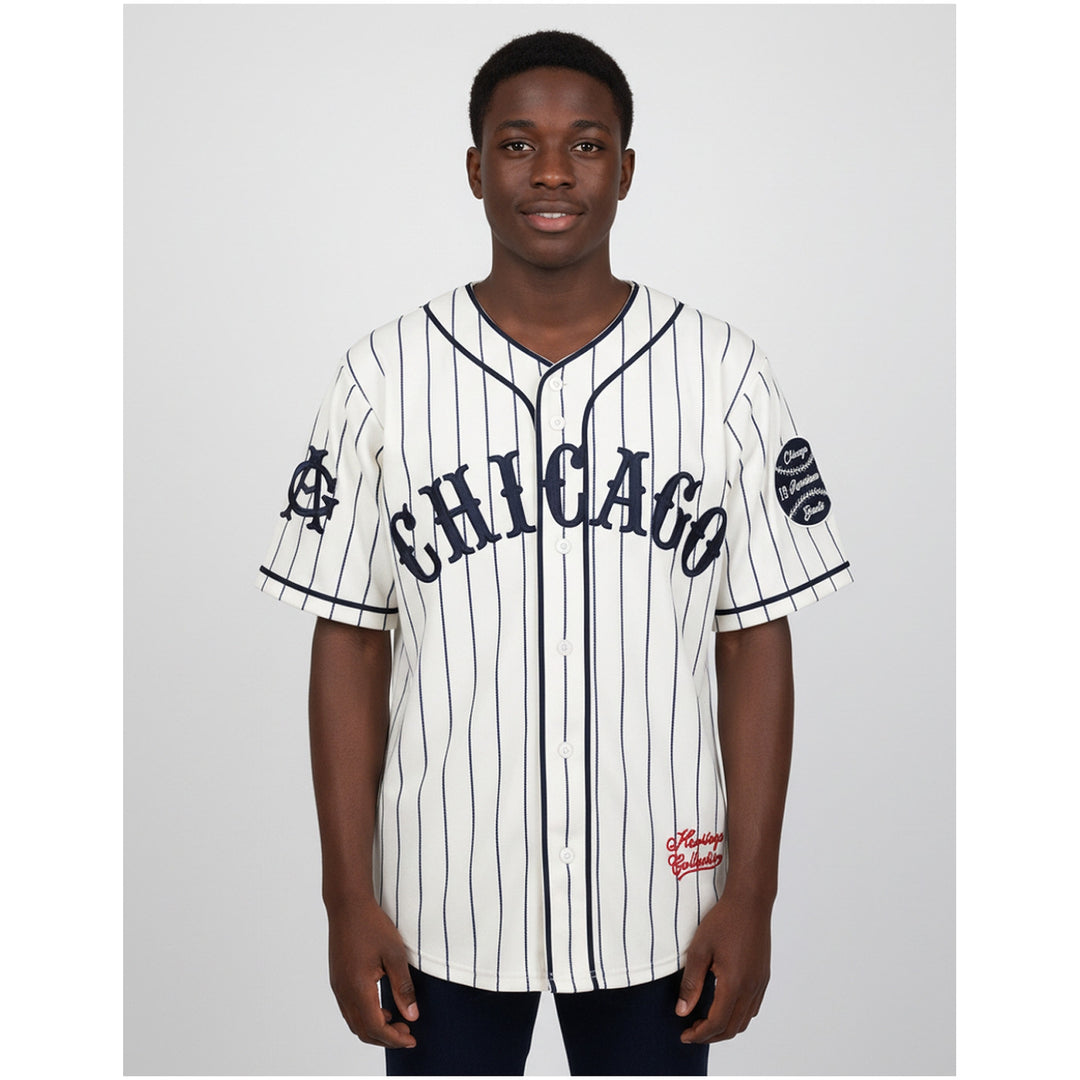 Chicago American Giants Heritage Negro Leagues Baseball Jersey (Lifestyle) - A man modeling a white and navy pinstriped baseball jersey with 'CHICAGO' across the chest, photographed against a light gray studio background.