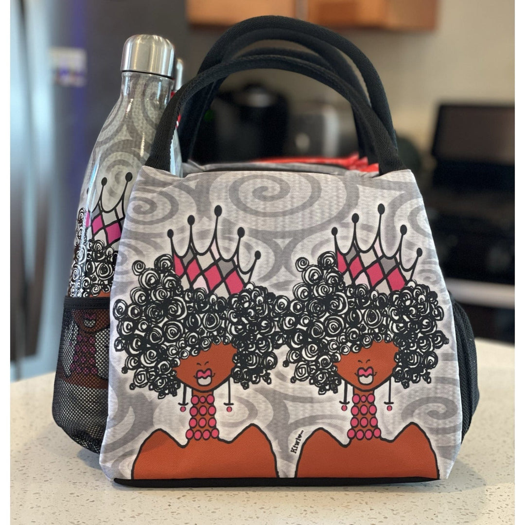 Kiwi McDowell's Crowns and Curls lunch bag with queens wearing pink crowns (Lifestyle 3)