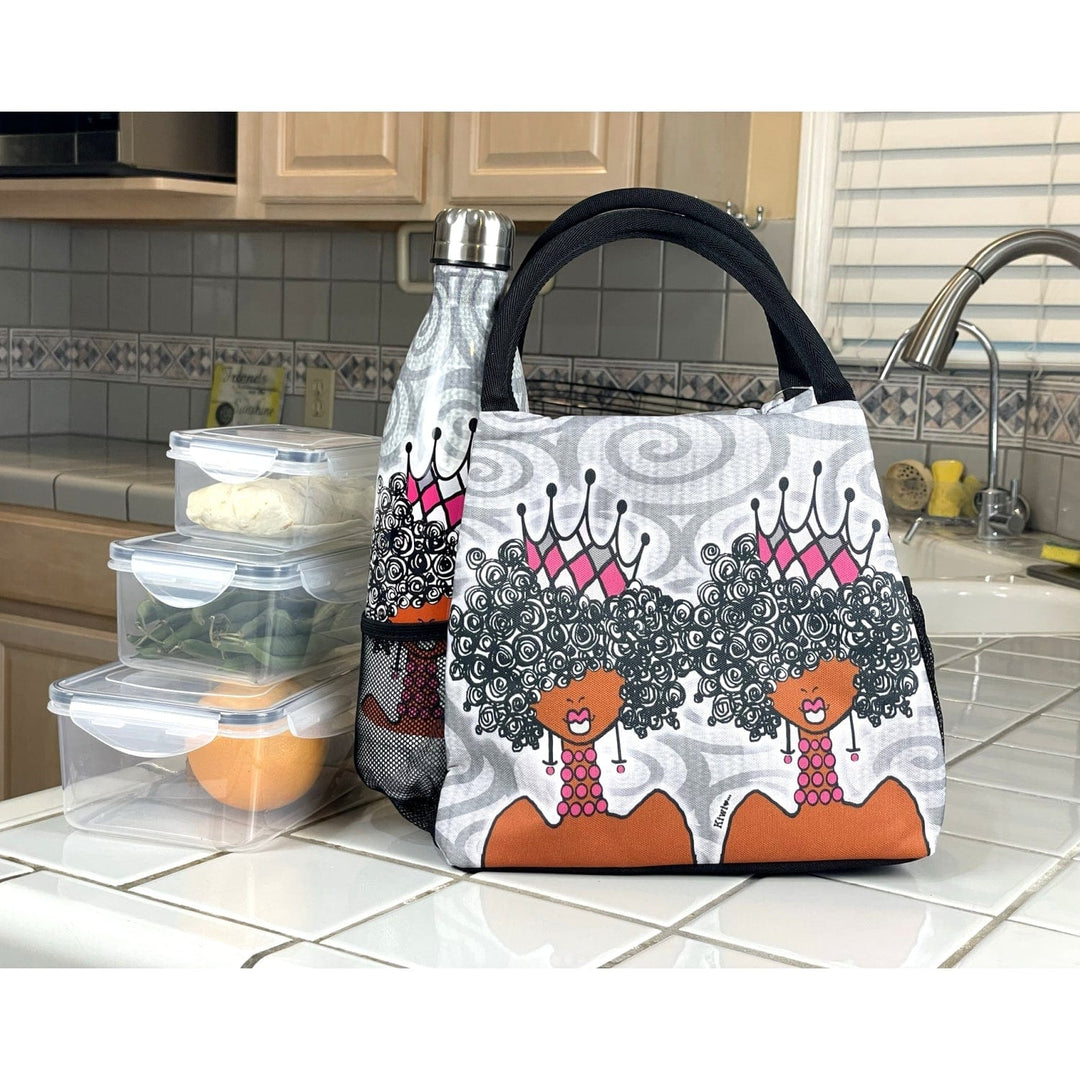 Kiwi McDowell's Crowns and Curls lunch bag with queens wearing pink crowns (Lifestyle 6)