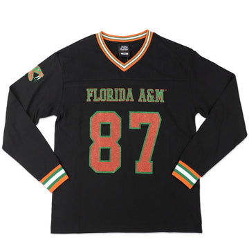 Florida A&M University Rattlers (FAMU) Long Sleeve Jersey Tee (Main) - A black long-sleeve Florida A&M hockey jersey with 'FLORIDA A&M' and the number '87' in orange with green outlines on the front, featuring orange, green, and white striped trim on the collar and cuffs.