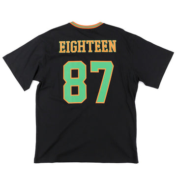 Florida A&M University Rattlers (FAMU) Oversized Jersey Tee (Rear) - Black short-sleeve t-shirt shown from the back, featuring the word 'EIGHTEEN' in yellow block letters and the number '87' in green with a yellow outline, on a plain white background.