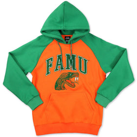Florida A&M University (FAMU) Rattlers Hooded Sweatshirt (Main) - A two-tone pullover hoodie with bright green raglan sleeves and hood, and a vibrant orange body. The front features 'FAMU' in green varsity lettering with a green snake graphic underneath.