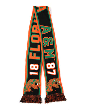 Florida A&M University Rattlers (FAMU) Winter Scarf (Main) - A black and orange A&M 87 Florida scarf with green trim, featuring the Florida Gators logo and 'A & M 87' and '18 FLOIDA' text, shown on a white background.