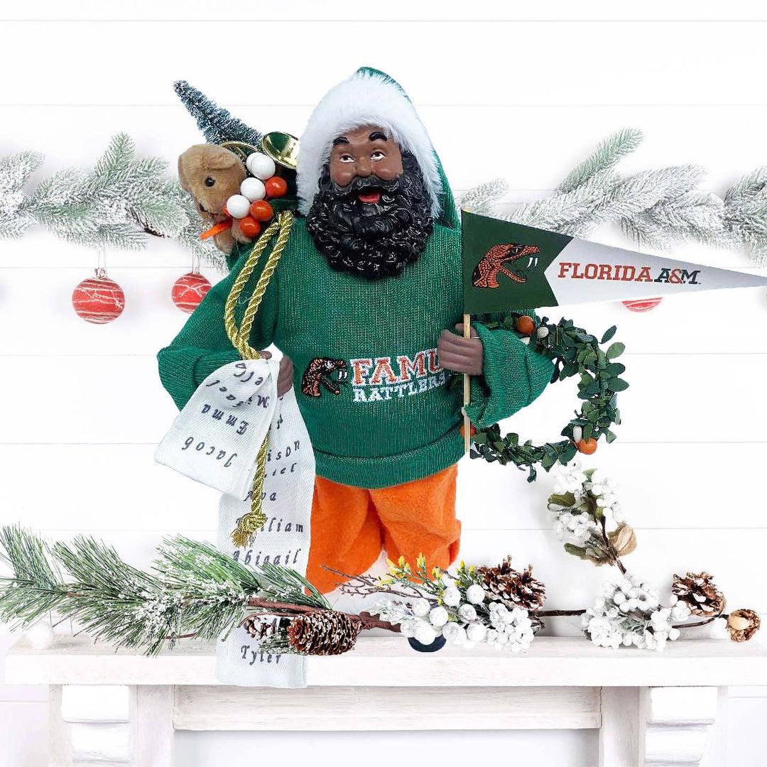 FAMU Rattlers Black Santa Claus figurine on a Christmas mantel with garland