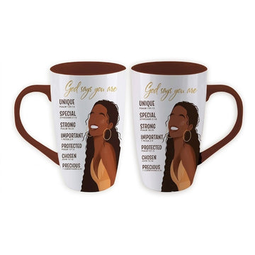 God Says You Are Ceramic Latte Mug (Main) - Two ceramic mugs with brown interiors and handles, featuring a printed illustration of a smiling Black woman and the text 'God says you are' along with affirmational words on a white background.