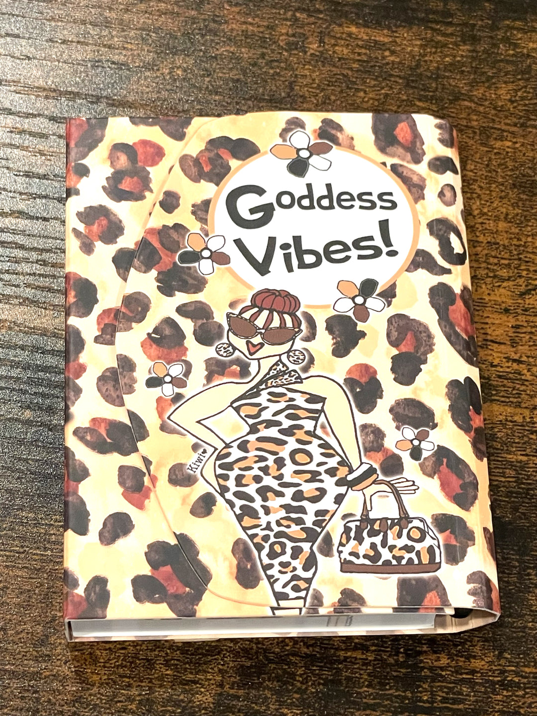 Goddess Vibes: African American Stylus Purse Pal by Kiwi McDowell (Lifestyle 3) - Notebook with leopard print design and 'Goddess Vibes!' text on a wooden surface