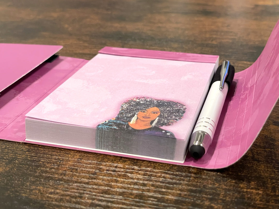 I am Everything: African American Stylus Purse Pal by Sylvia "Gbaby" Cohen (Interior 2) - Pink notebook with a portrait on the cover and a pen on a wooden surface