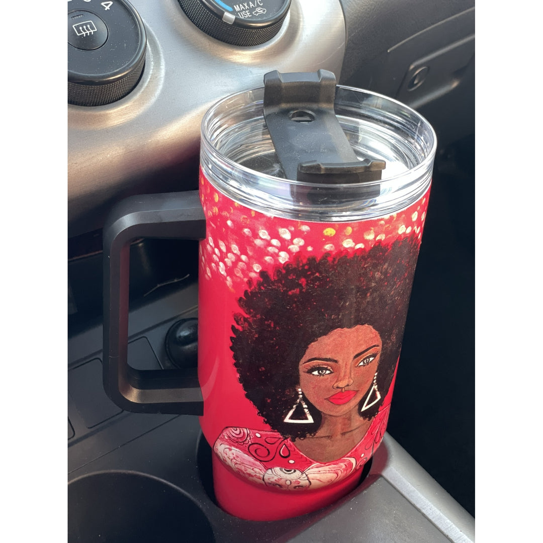 I am Powerful by Sylvia "GBaby" Cohen: Detla Sigma Theta Tumbler with Handle (Lifestyle) - A red handled tumbler with a clear lid and black flip-straw cover, featuring an illustrated portrait of a Black woman with an afro, placed in a car cup holder.