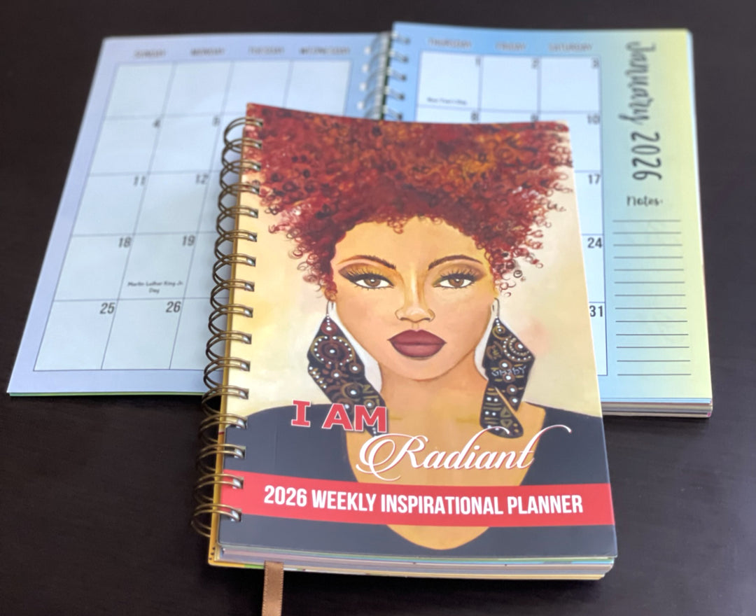 I Am Radiant by Syliva "Gbaby" Cohen: 2026 African American Weekly Inspirational Planner (Lifestyle Combo) - 2026 Weekly Inspirational Planner with a woman's face on the cover, displayed in front of a calendar.