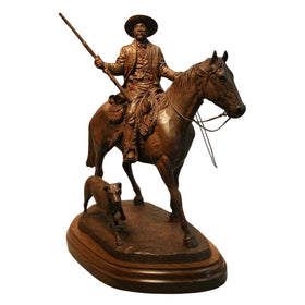 Into the Territory: Bass Reeves Sculpture by Harold Holden (Main) - Bronze statue of a man on horseback with a dog on a white background