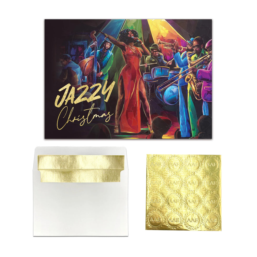 Jazzy Christmas by Carl M. Crawford: African American Christmas Card Box Set (Card and Envelope ) Colorful Christmas card with a jazz theme featuring a woman in a red dress and musicians, accompanied by a gold foil card and envelope.
