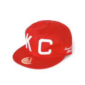Kansas City Monarchs Heritage Cotton Snapback Baseball Cap (Front) - Red cap with 'KC' and 'Kansas City' text on a white background