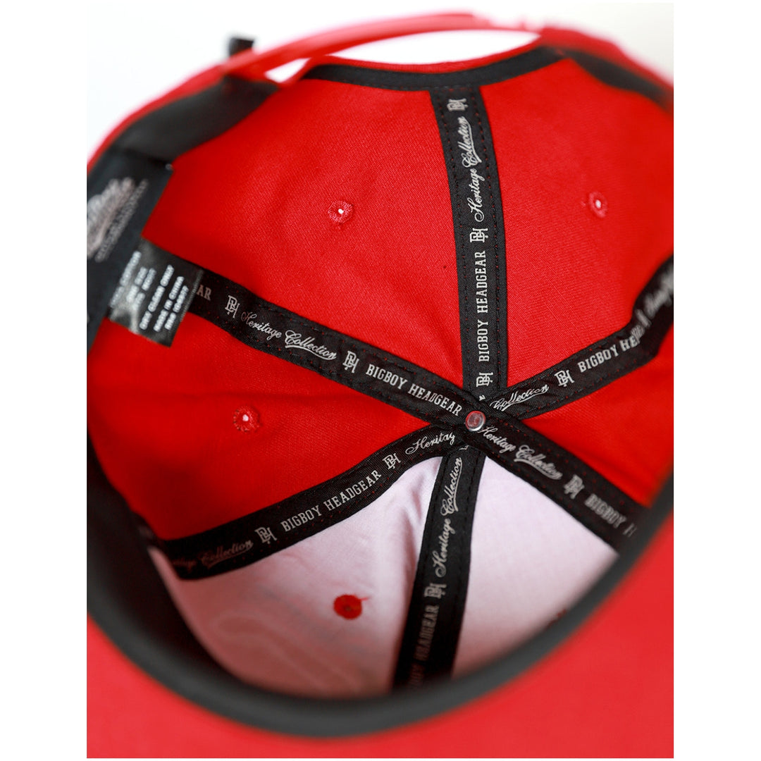 Kansas City Monarchs Heritage Cotton Snapback Baseball Cap (Inside) - Close-up of a red cap with black adjustable strap on a white background