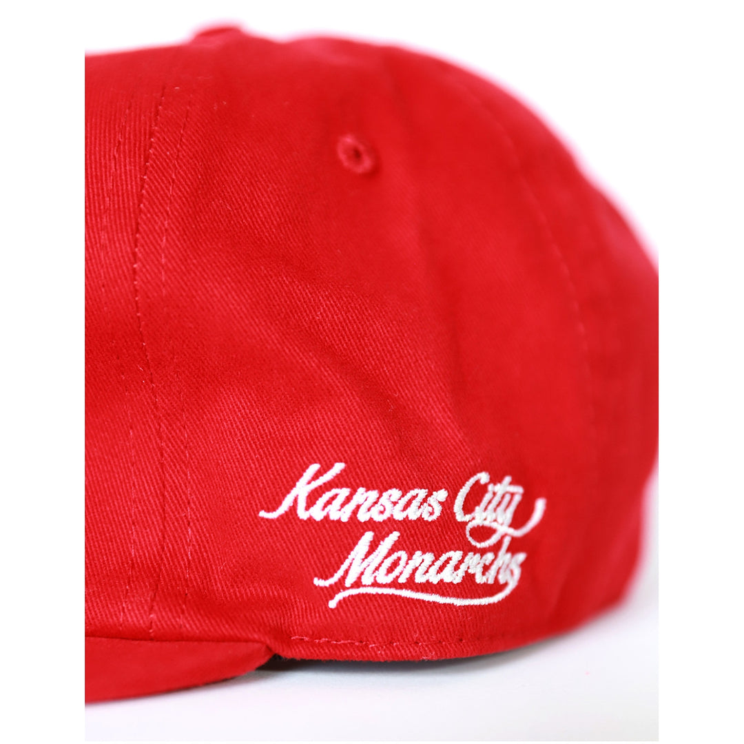 Kansas City Monarchs Heritage Cotton Snapback Baseball Cap (Side Detail) - Red cap with 'Kansas City Monarchs' logo on a white background