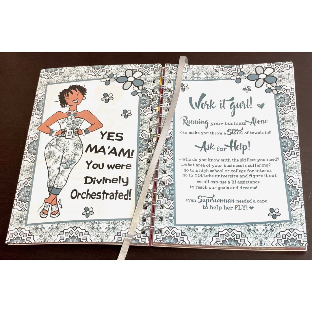 It's Extra Season by Kiwi McDowell: 2026 Weekly Inspirational Planner (Motivational Art) - Open book with motivational text and illustration on a wooden surface