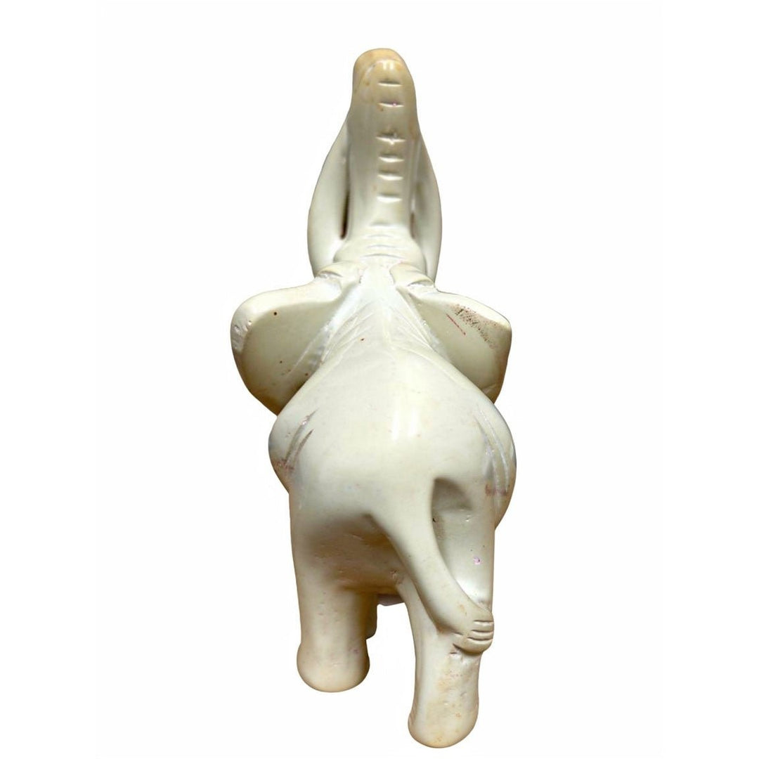 Leading the Way: Legacy and Leadership Elephant Soapstone Sculpture (Rear) - White ceramic figure on a white background (Delta Sigma Theta Gift)