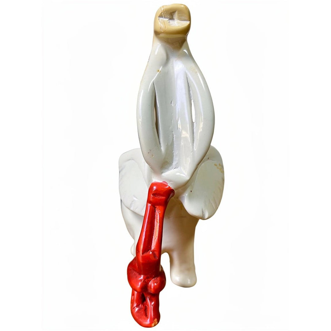 Leading the Way: Legacy and Leadership Elephant Soapstone Sculpture (Front) - Decorative item resembling a white swan with red feet on a white background (Delta Sigma Theta Gift)
