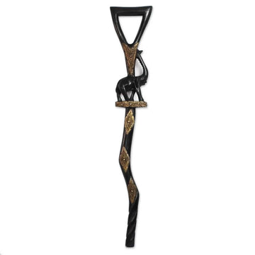 Loyalty and Community (Strolling Elephant): Decorative African Wooden Walking Stick (Front) - A decorative black walking stick with gold accents, featuring a carved horse figure and geometric diamond patterns on a plain white background.