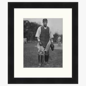 Louis Santop: Big Bertha by Omari Dixon - Framed black and white photograph of a vintage baseball player on a field.