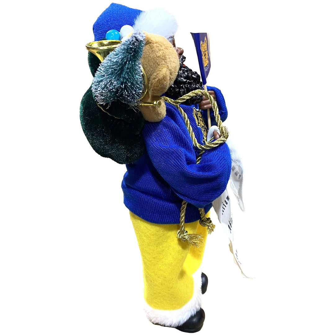 Side view of NC A&T Santa figurine with green toy sack, mini tree and gold pants