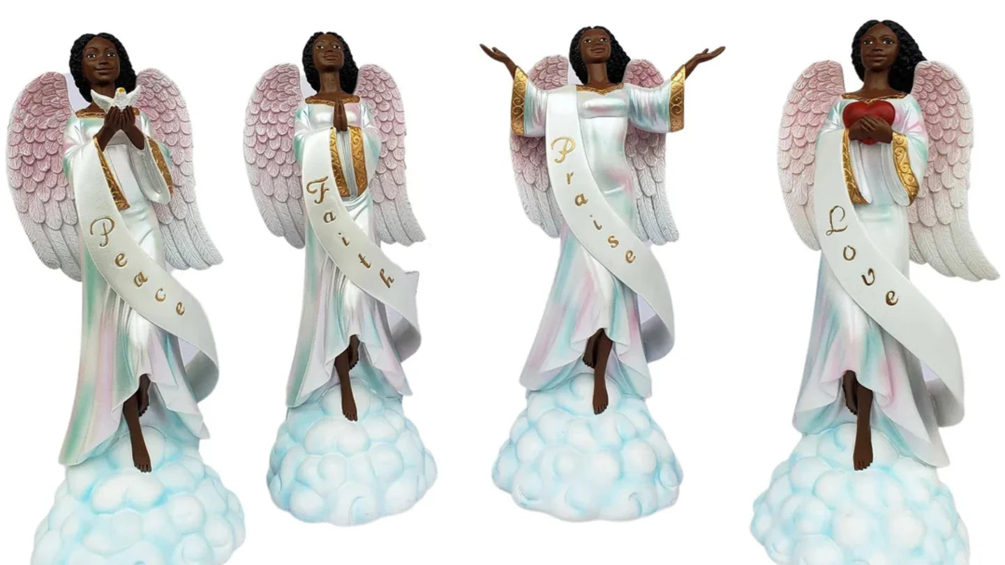 African American Angelic Figurine Collection - Four angel figurines with wings and sashes on a white background