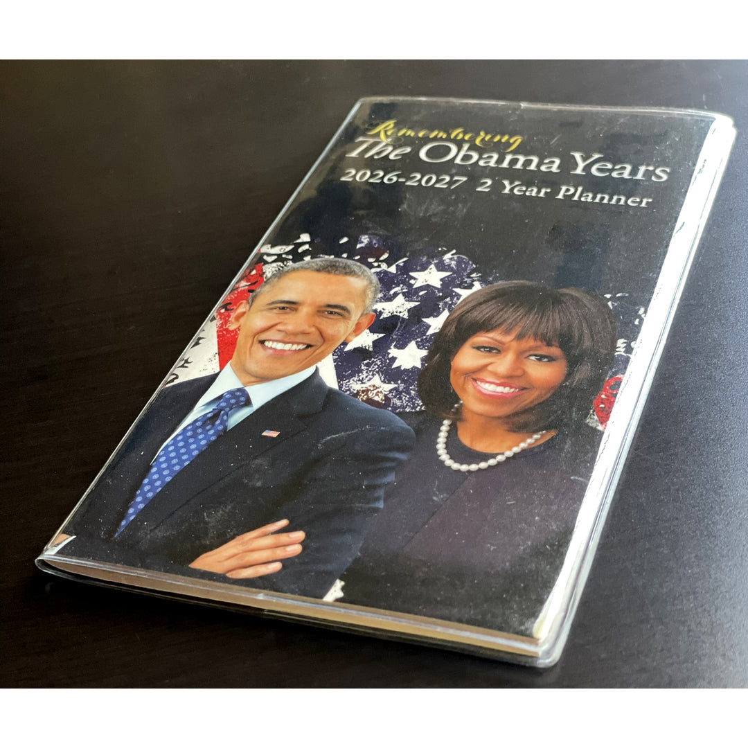 Remembering The Obamas: 2026-2027 Commemorative Two Year African American Planner (Lifestyle Photo) - Planner with images of a man and woman on a black background