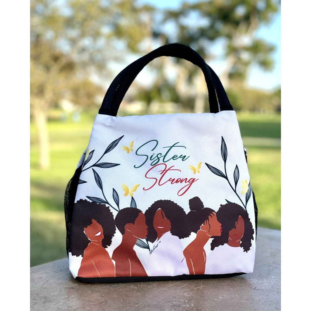 Janine Kai Robinson's Sister Strong lunch bag featuring Black women silhouettes (lifestyle 3)