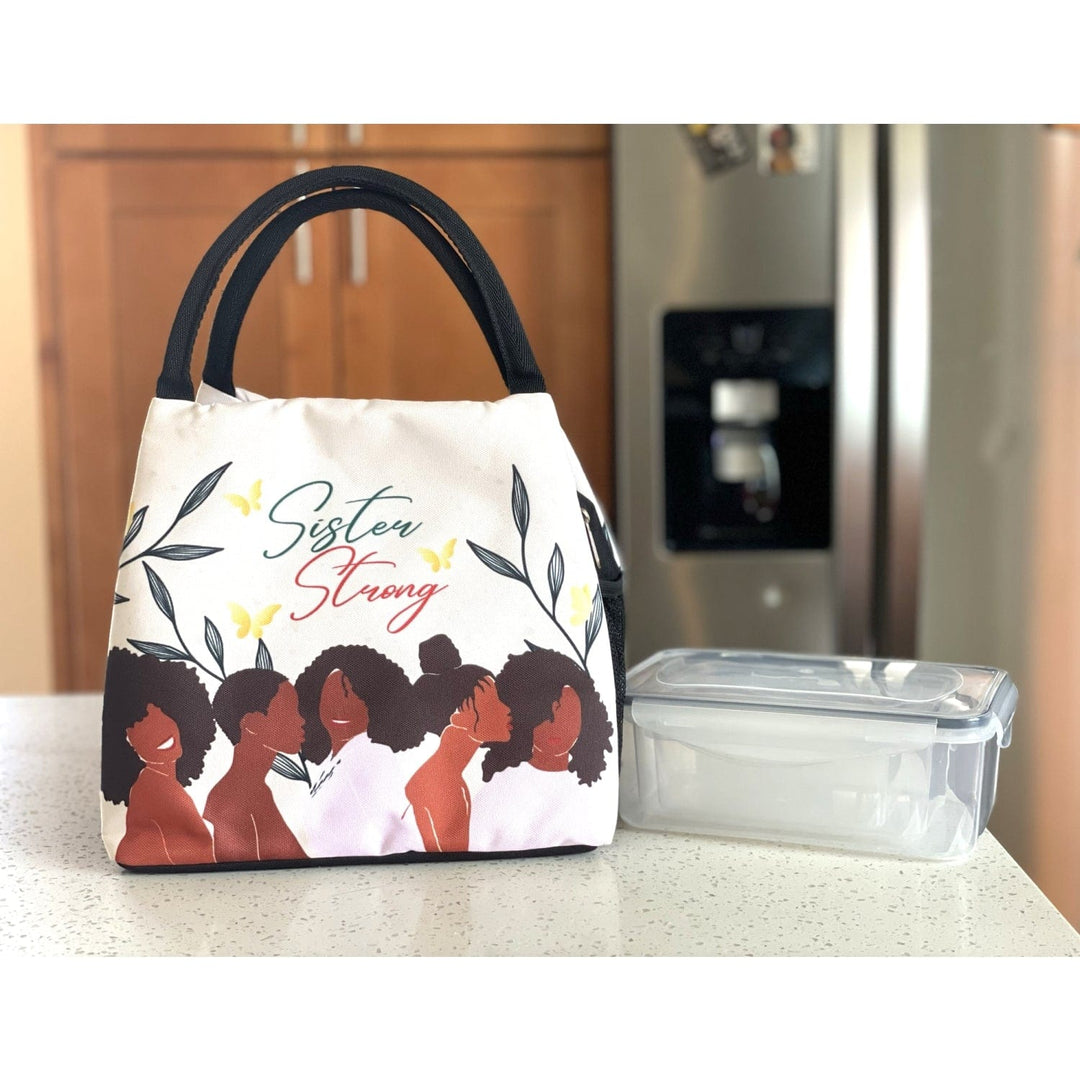 Janine Kai Robinson's Sister Strong lunch bag featuring Black women silhouettes (lifestyle 4)
