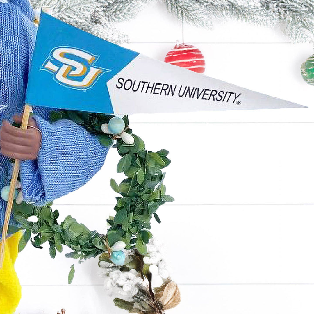 Blue and white SOUTHERN UNIVERSITY pennant and wreath held by Santa figurine