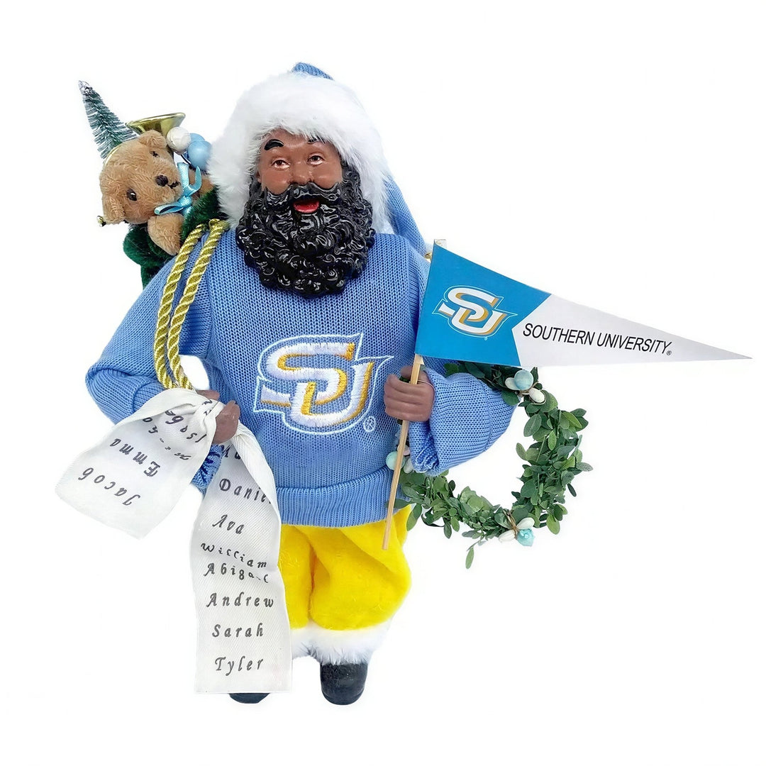 Southern University Jaguars: HBCU Proud African American Santa Claus Figurine (Main) - Decorative figurine of a man in a blue sweater with a Southern University logo, holding a flag and a list, on a white background.
